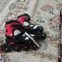 کفش اسکیت به همراه کلاه و وسایل
