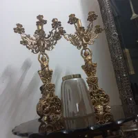 دو عدد شمعدان برنجی
