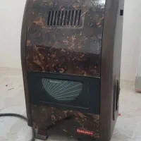 صفحه کابینت ،پرده زبرا،بخاری،میز کامپیوتر