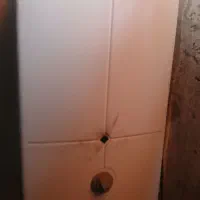 اب گرم کن بوتان نیمه بزرگ سالم