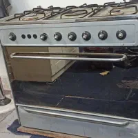 اجاق گاز فر دار پنج شعله و جوجه گردان