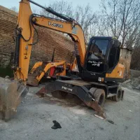 مینی بیل مکانیکی لاستیکی ۷ تن