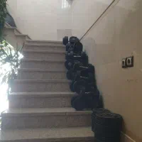 دمبل و صفحه باشگاهی