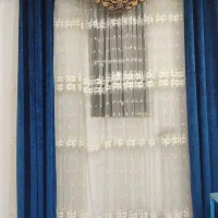 پرده توری سفید و کتیبه