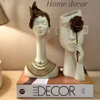 مجسمه دختر آفریقایی و گلرخ