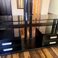 میز تلویزیون مشکی ۴ کشو چرخدار شیک