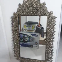 آینه کنسول و شمعدانی