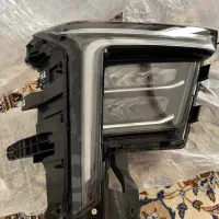 چراغ جلوی کی ام سی ایکس۵ سمت شاگرد رنگ سفید یخی