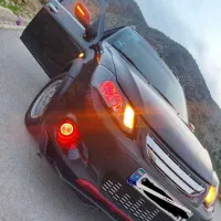 کوئیک R مشکی قرمز اسپرت
