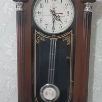 ساعت دیواری طرح چوب