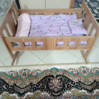 تخت گهواره ای کودک