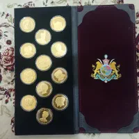 یک آلبوم سکه آب طلا پهلوی