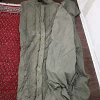 کیسه خواب و کاپشن و گتر و دستکش کوهنوردی