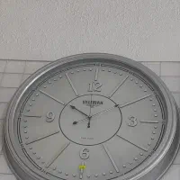 ساعت دیواری نقره ایی