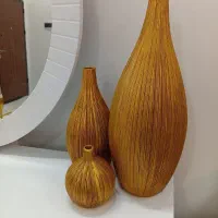 مجسمه و گلدان
