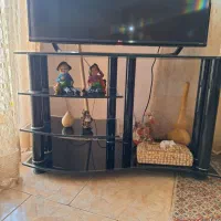 میز تلویزیون شیشه‌ای