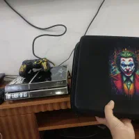 یک عدد دستگاه PS4 fat دو دسته+ کیف و استند و پایه