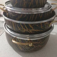 یه دست قابلمه