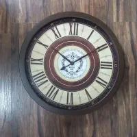 ساعت دیواری چوبی و فلزی نصف قیمت