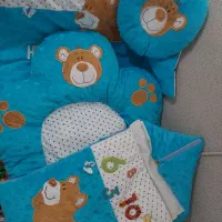 ۴ تکه تشک و پتو وبالش و کیسه خواب نوزاد