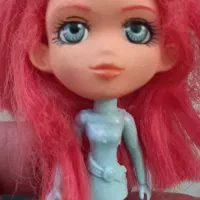 عروسک مو قرمزی