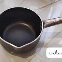تابه وک و شیر جوش لبه دار