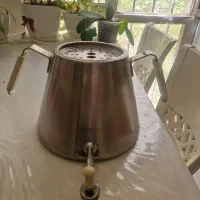 کتری شیر دار  کار کرده