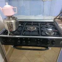 لباسشویی کنوود و گاز فر دار