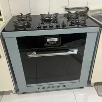 اجاق گاز پنج شعله صفحه  شیشه ای استار استیل