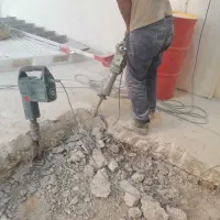 تخریب با پیکور دریل فرز با حمل نخاله