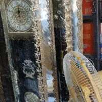 بوفه و ساعت ایستاده برنز .  برنزی