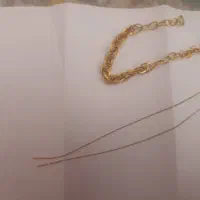 دستبند و گوشواره ۳۰۰ بالای تابلو
