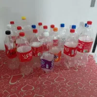 بطری خالی نوشابه خانواده برای عرقیجات و رب
