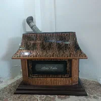 بخاری و فرش کودک وکفش