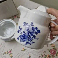 قوری همراه با وارمر