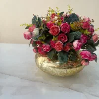 گلدان و شمعدانی