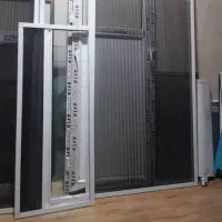 توری پلیسه و پنجره دوجداره