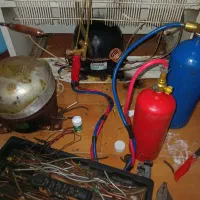 تعمیرات تخصصی یخچال شارژگاز و نوار دور در درمحل
