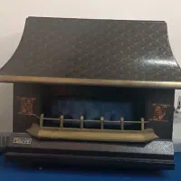بخاری گازی طرح شومینه دار