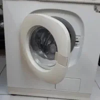 ماشین لباسشویی و گاز کابینتی ودوچرخه