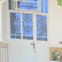 درب حال و پنجره بزرگ خونه دوبلکس