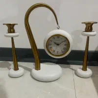 ساعت رو میزی به همراه شمعدان