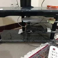 زیر تلویزیونی شیشه همراه با دستگاه