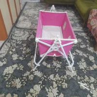گهواره به همراه پشه بند