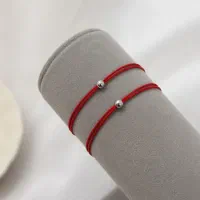 دستبند رد استرینگ با گوی استیل رنگ ثابت