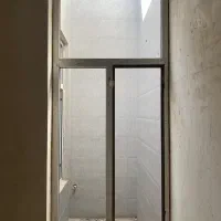 پنجره‌ی دو جداره‌ی آلومینیوم