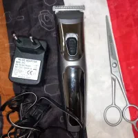 ریش تراش شارژی باادابتور.قیچی استیل اصل نو تیز