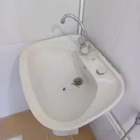 دستشویی و شیر آب