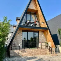 کلبه چوبی استخردارژولیت  با ایرهاکی