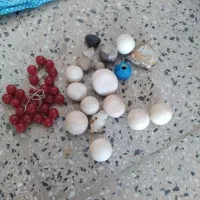 کمربند بافتنی و سنگ اسیاب اصل و تعدادی ساعت